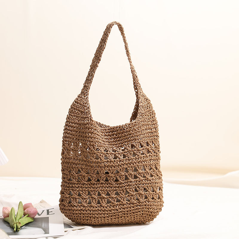 Crocheted shoulder bag with decorative openwork pattern Skanto
