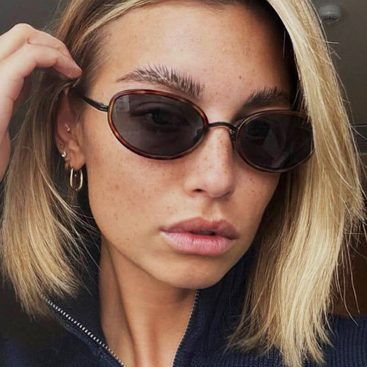 Women's elegant round sunglasses with modern metal frame Skanto
