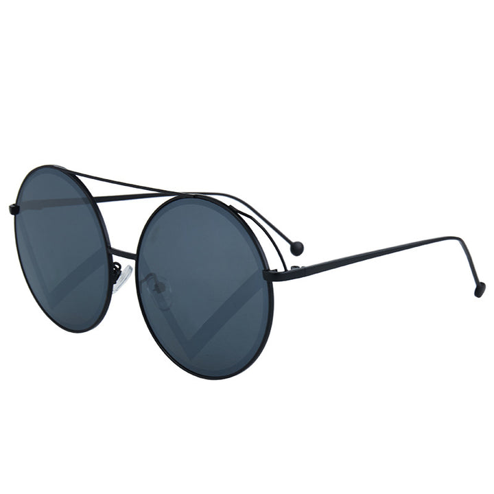 Kvinnelige fashionable runde solbriller Skanto