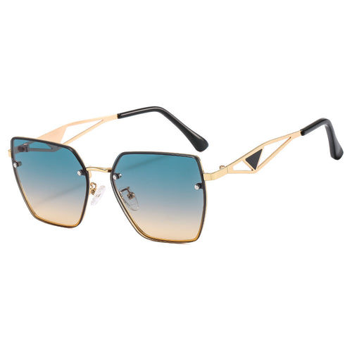 Dame geometrisk solbrille med filigran design Skanto