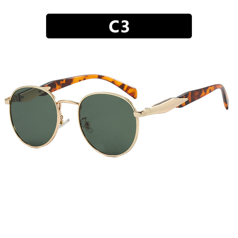Women's round sunglasses with elegant, gold frame and UV protection Skanto