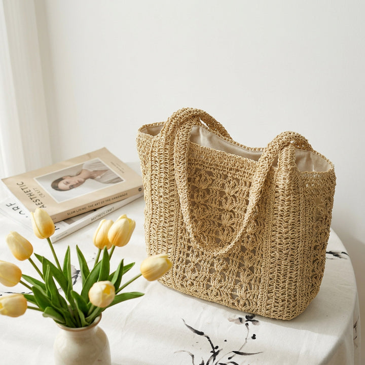 Håndveske i boho-stil laget av flettet naturmateriale Skanto