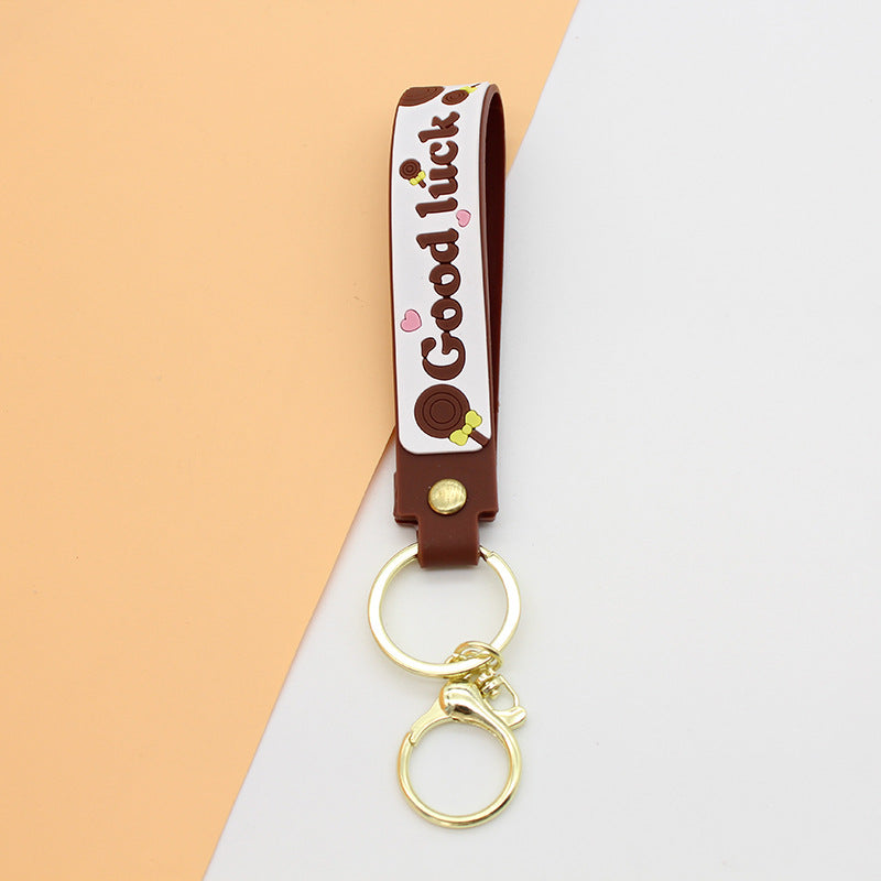 Unisex nøkkelring med motiverende lykke-sitat Skanto