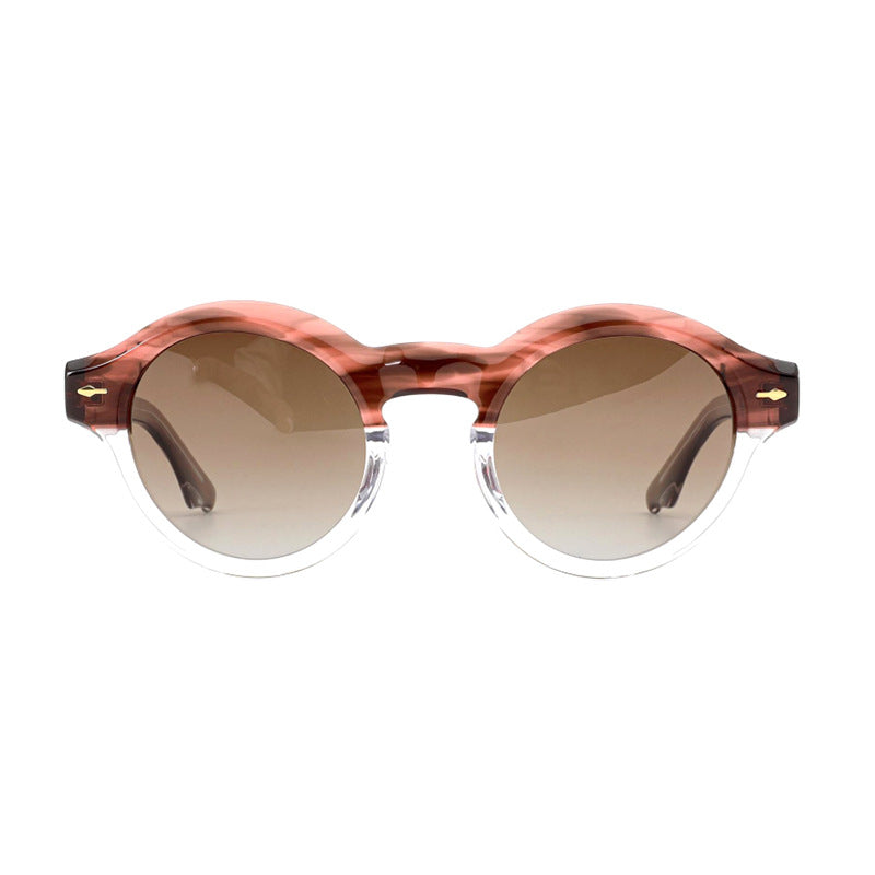 Dame solbrille i elegant retro-design med robust ramme Skanto