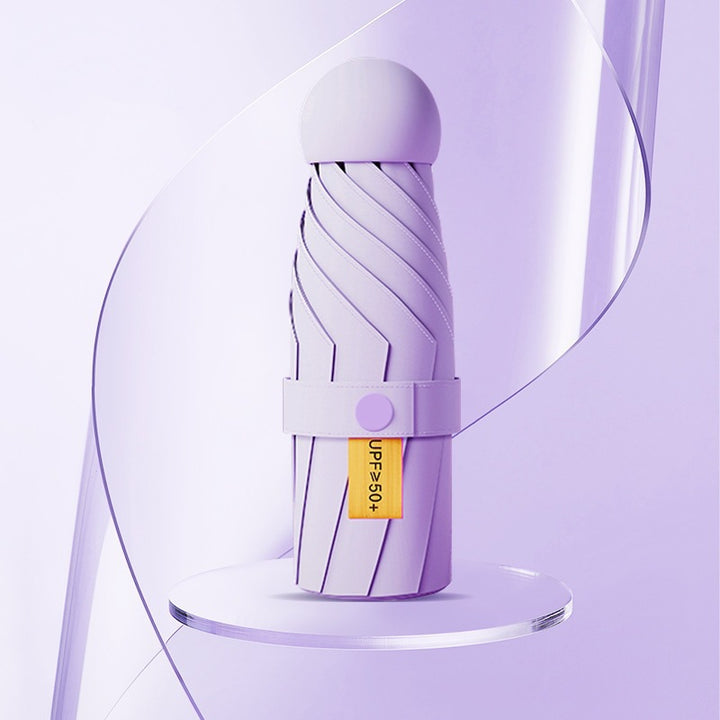 Damer UV-beskyttende sammenleggbar paraply med unikt design Skanto