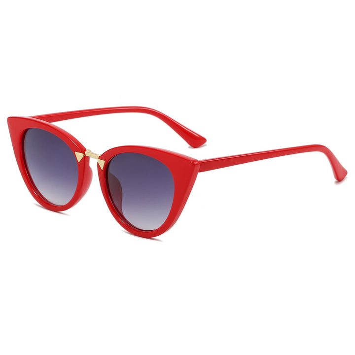 Dame Cat-Eye solbrille med elegant gull detaljer Skanto