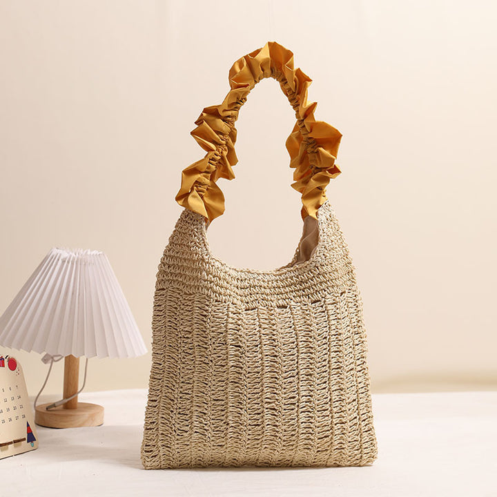 Elegant handbag with ruched decorative handle Skanto