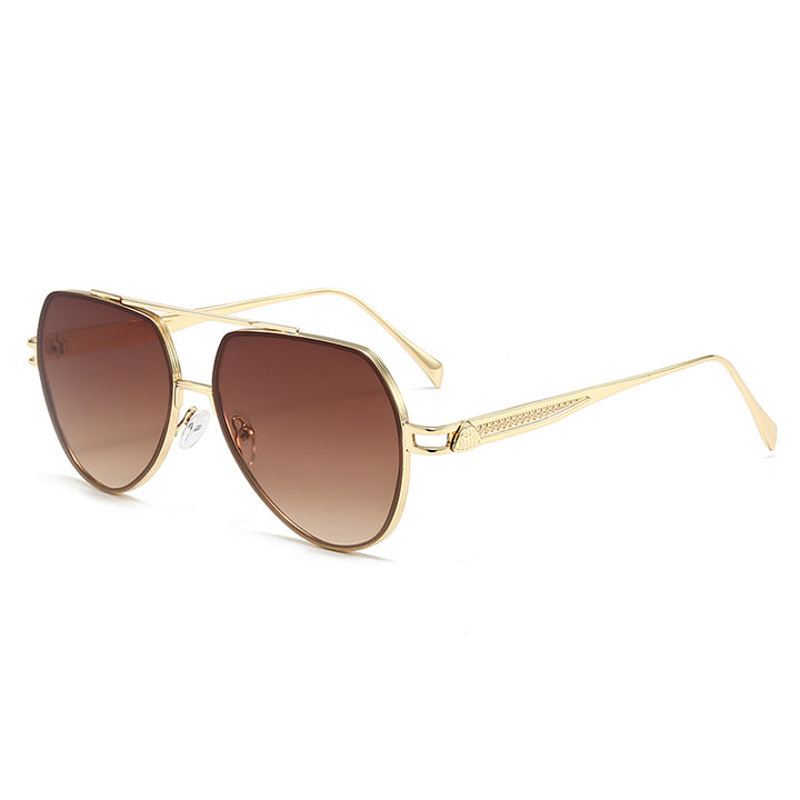 Dame Designer-solbrille i stilfull, bølget metallramme Skanto
