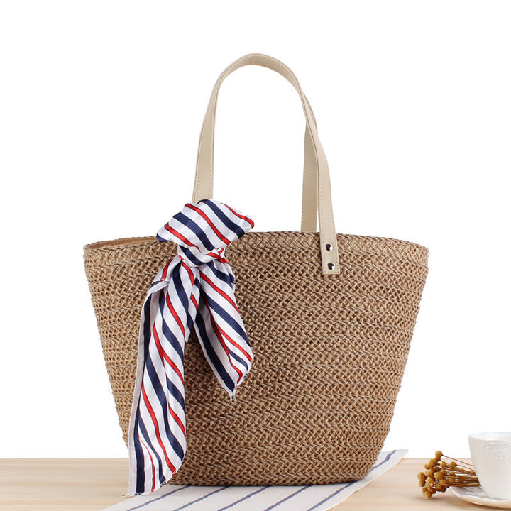 Straw bag with modern knot closure Skanto