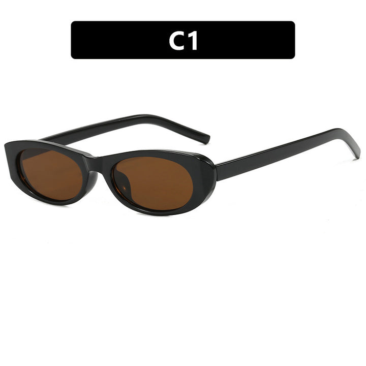 Dame moteriktig solbrille i elegant oval ramme Skanto