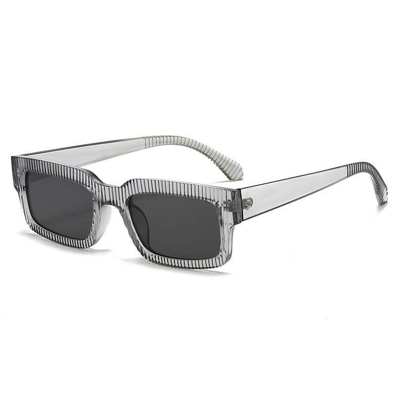 Dame moteriktig solbrille med geometrisk ramme Skanto