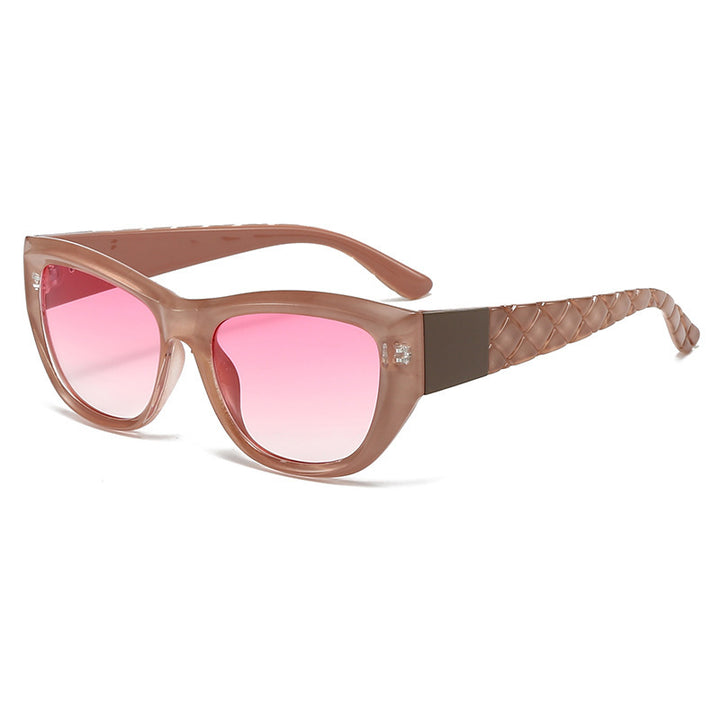 Dame Cat-Eye solbrille med elegant, transparent ramme Skanto