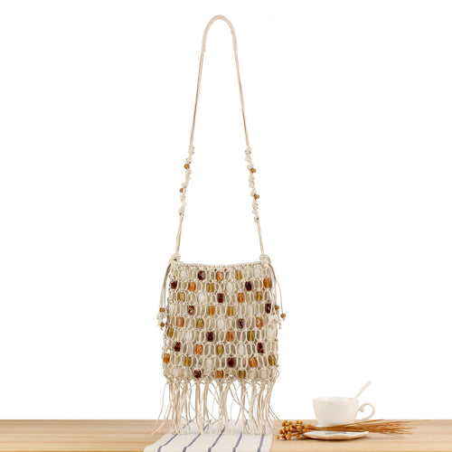 Handmade shoulder bag with decorative beads and fringes Skanto