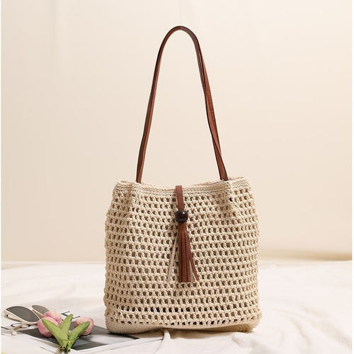 Hand-knotted basket bag with elegant leather handle Skanto