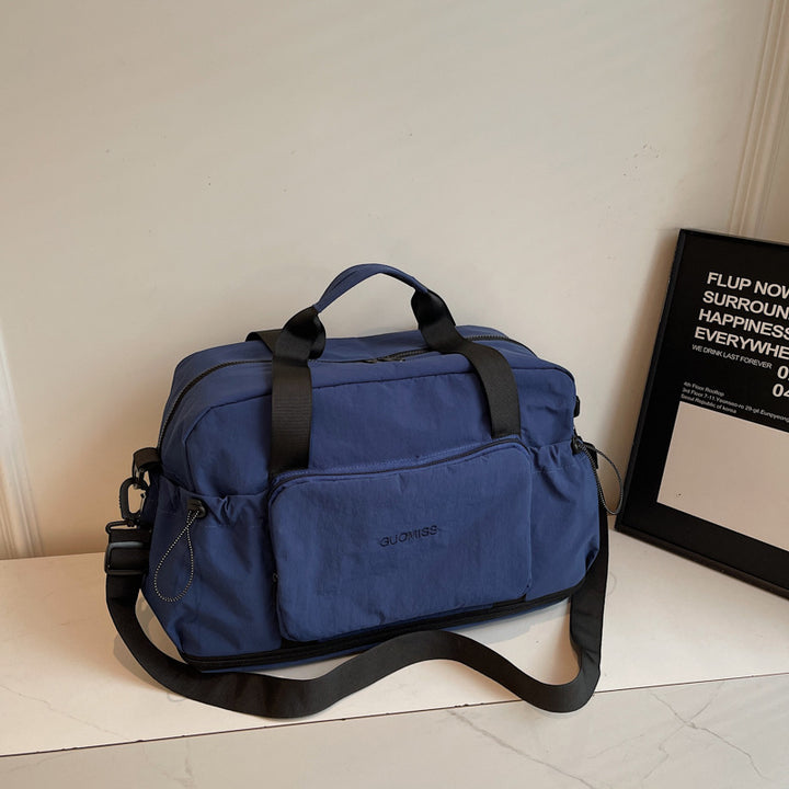 Multifunksjonell sport- og reiseveske med organizer Skanto