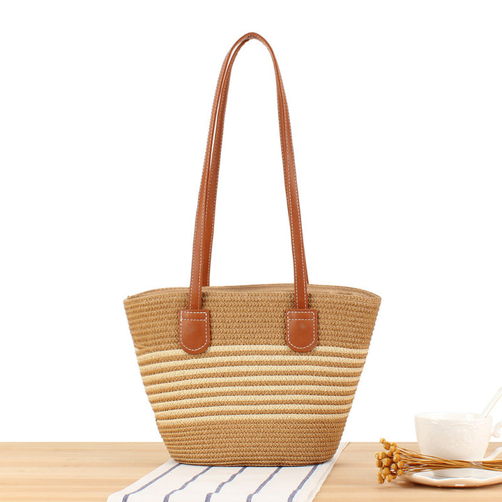 Handbag made of high-quality raffia with elegant leather handles Skanto