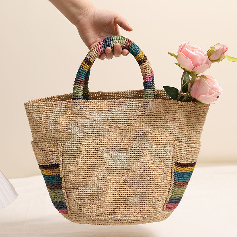 Handmade basket bag with colorful stripe accents Skanto
