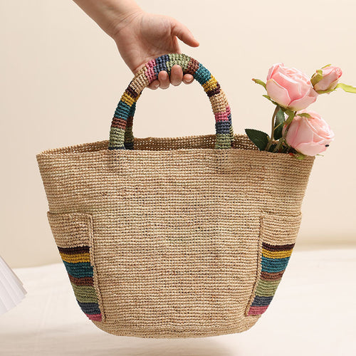 Handmade basket bag with colorful stripe accents Skanto