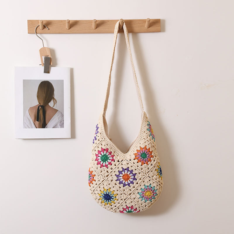 Handmade crocheted bag with colorful floral pattern Skanto