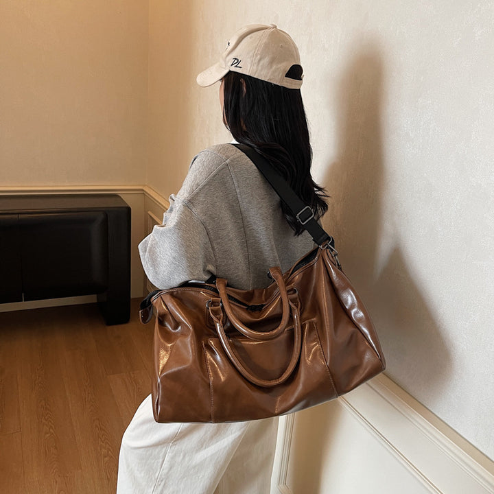 Praktisk hverdagsduffelbag med robuste hanke Skanto