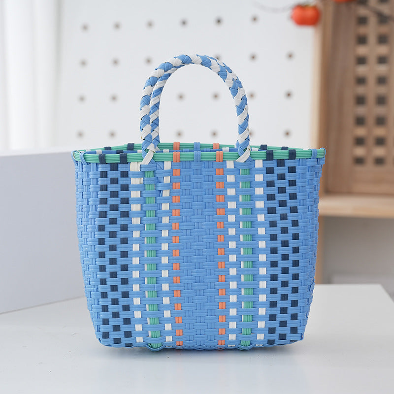 Håndveske av slitesterkt plastmateriale med flettet design Skanto