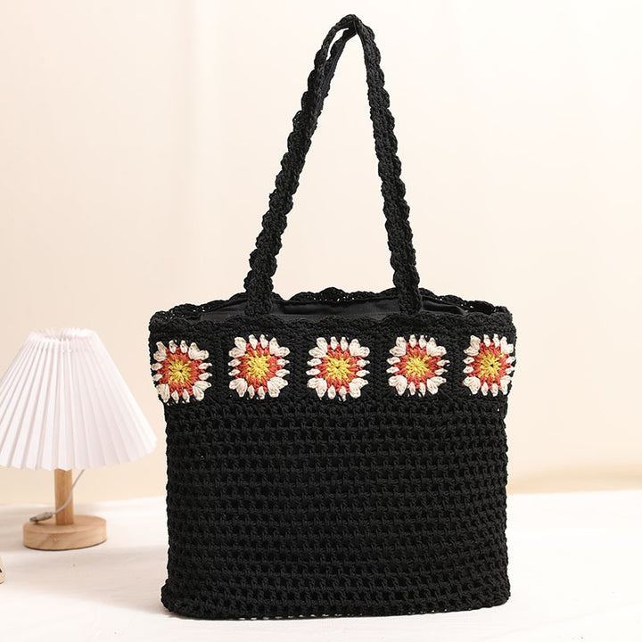 Hand-crocheted beach bag with floral accents Skanto