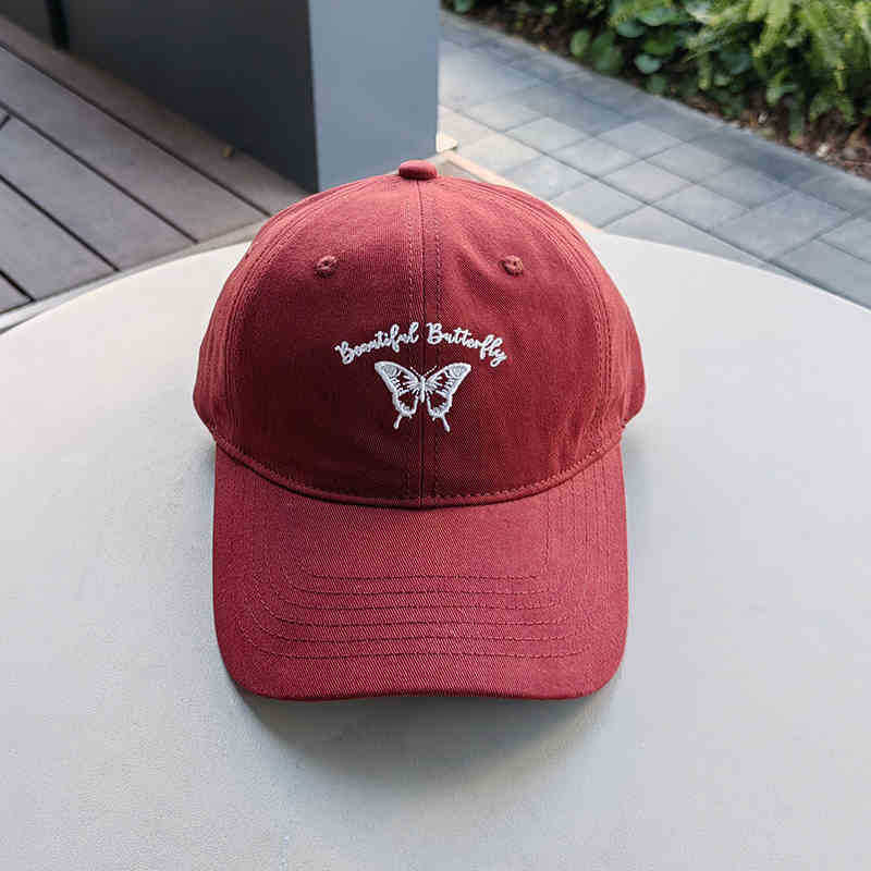 Kvinnens broderte sommerfugl caps Skanto