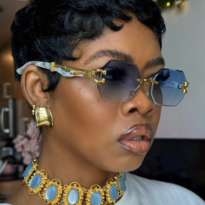 Women's fashionable sunglasses with extravagant octagonal design and gold accents Skanto