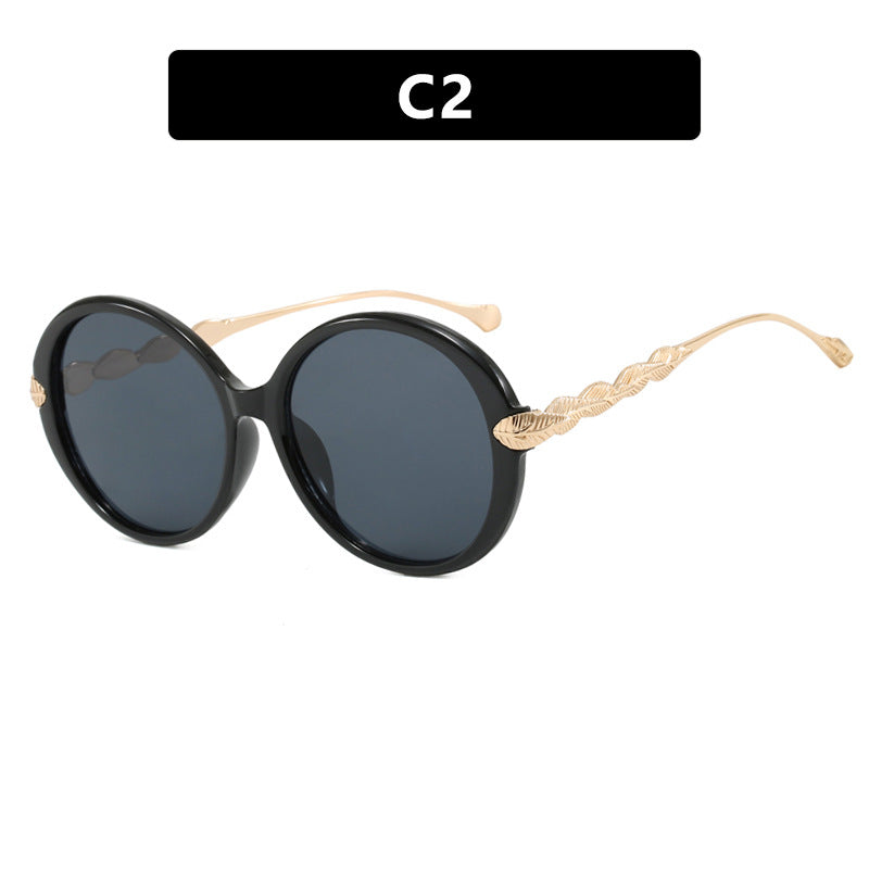 Women's large round sunglasses with decorative metal accents Skanto