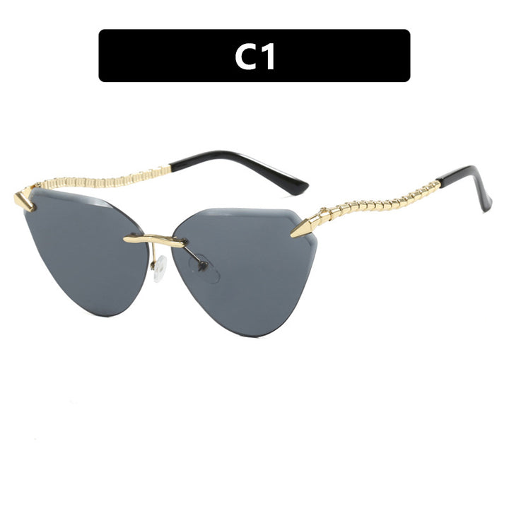 Women's Cat-Eye Sunglasses with Unique Gold Frame Design and Protective Lenses Skanto