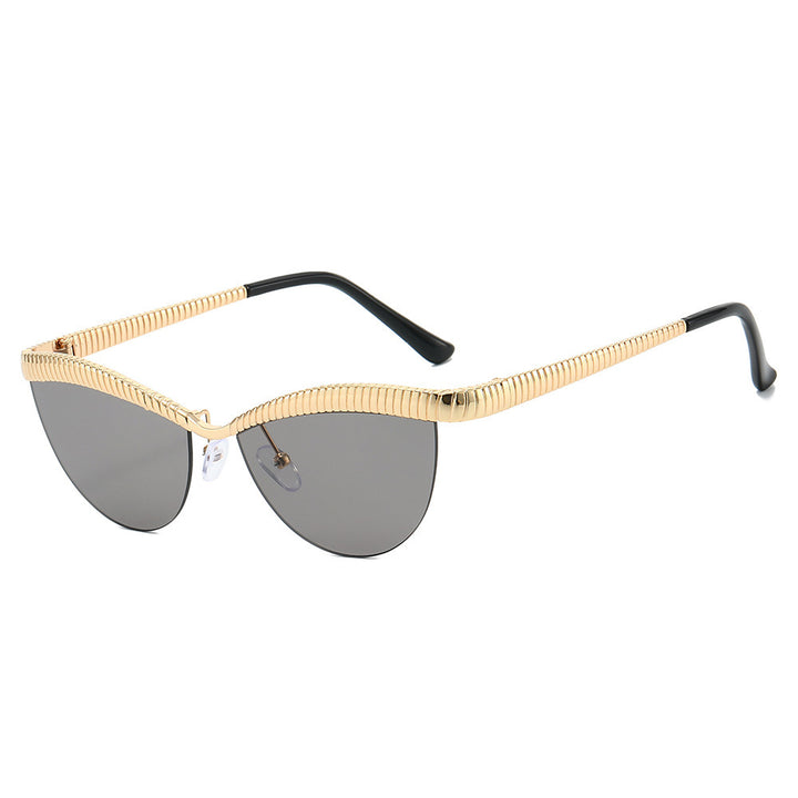 Dame Designer solbrille med unikt, bølget ramme Skanto