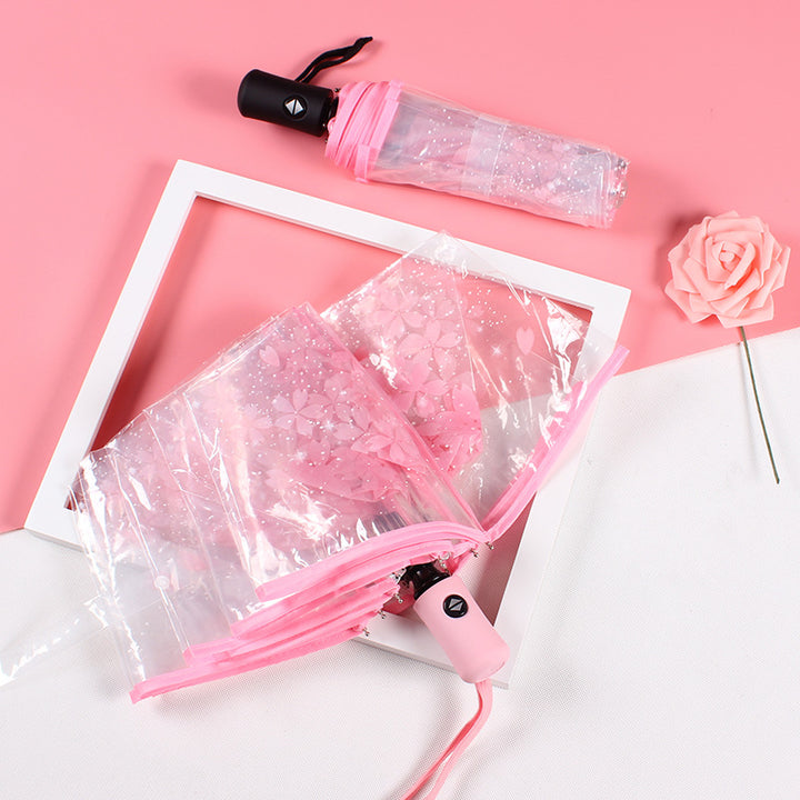 Damer elegant og bærbar paraply med blomsterdesign Skanto