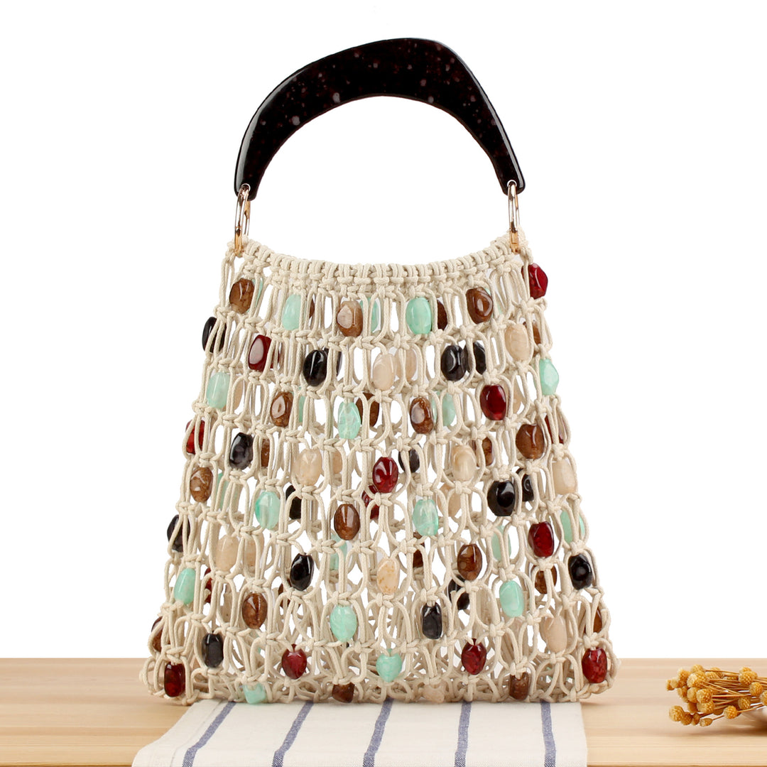 Handbag with colorful jewelry element Skanto