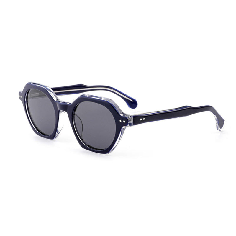 Dame solbrille i stilfull, sekskantet design med robust ramme og UV-beskyttelse Skanto