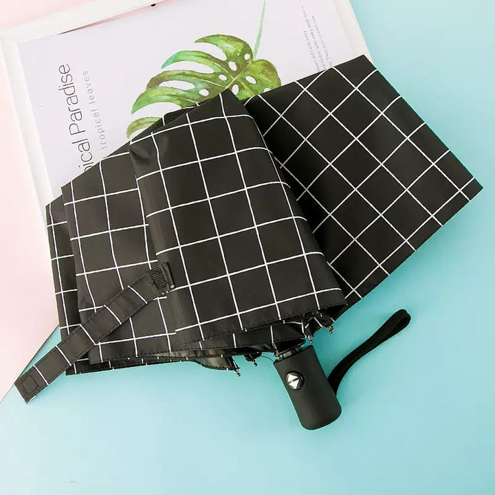 Kvinne Falt Paraply med Elegant Fjærdesign Skanto