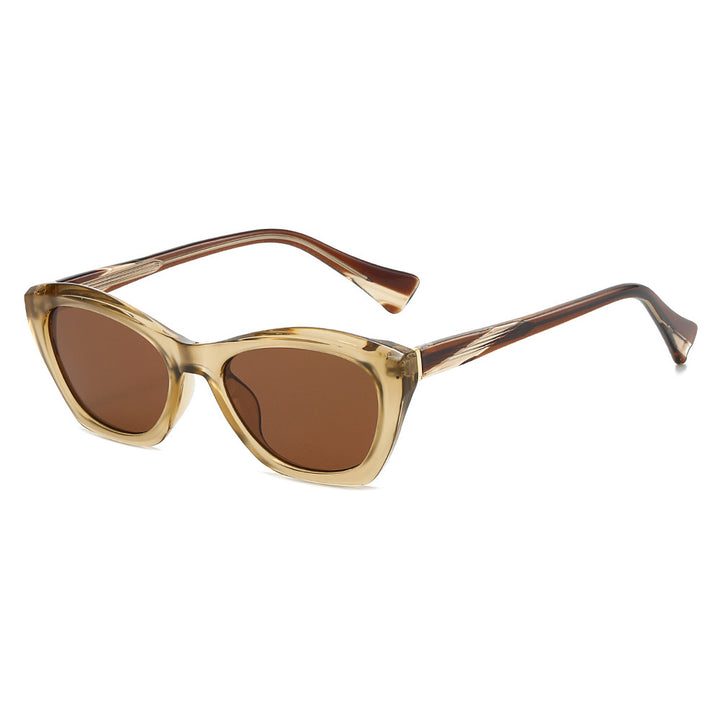Dame Cat-Eye solbriller med transparente og fargede detaljer Skanto
