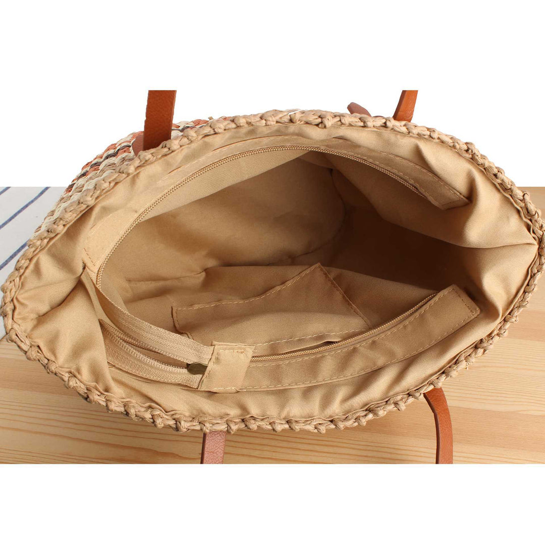 Tote bag made of woven natural material with elegant leather handles Skanto