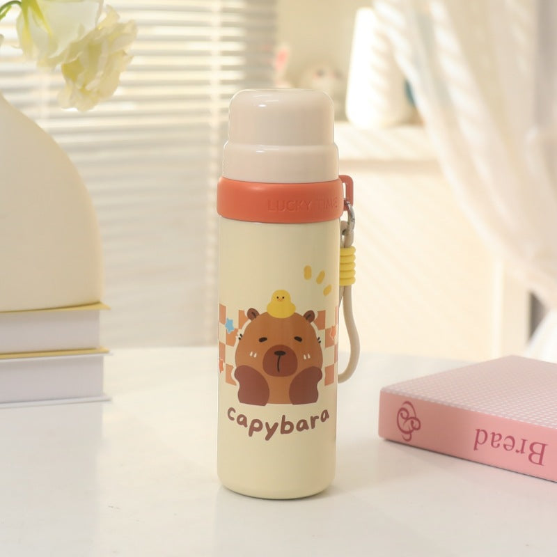 Dame Isolert drikkeflaske med lekent dyremønster og praktisk bæresnor Skanto