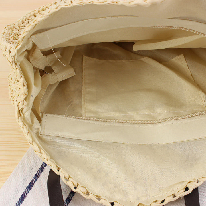 Round basket bag with sturdy leather handles Skanto