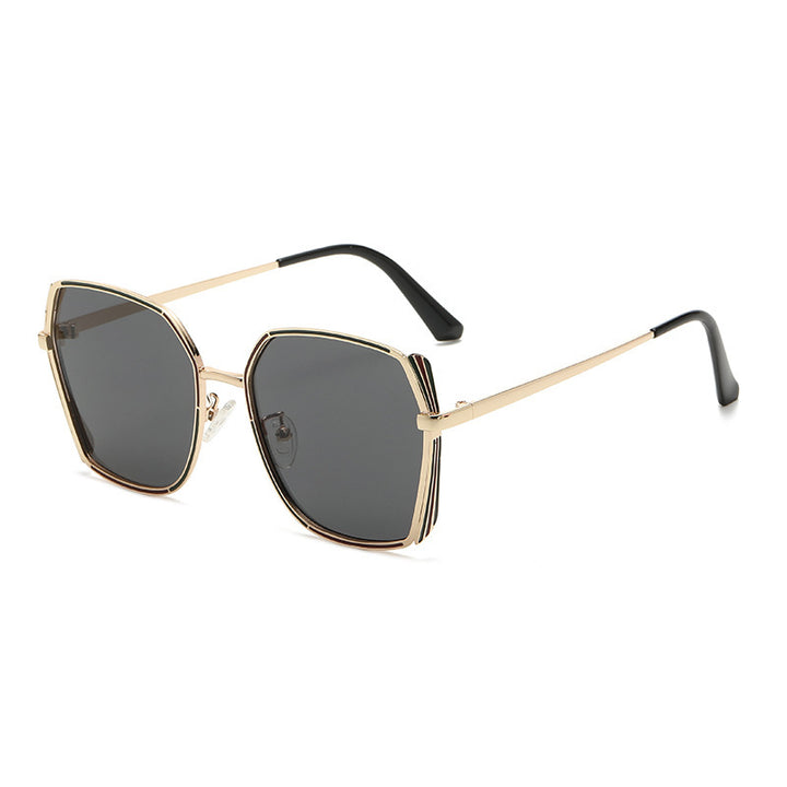 Dame stor og elegant solbrille Skanto