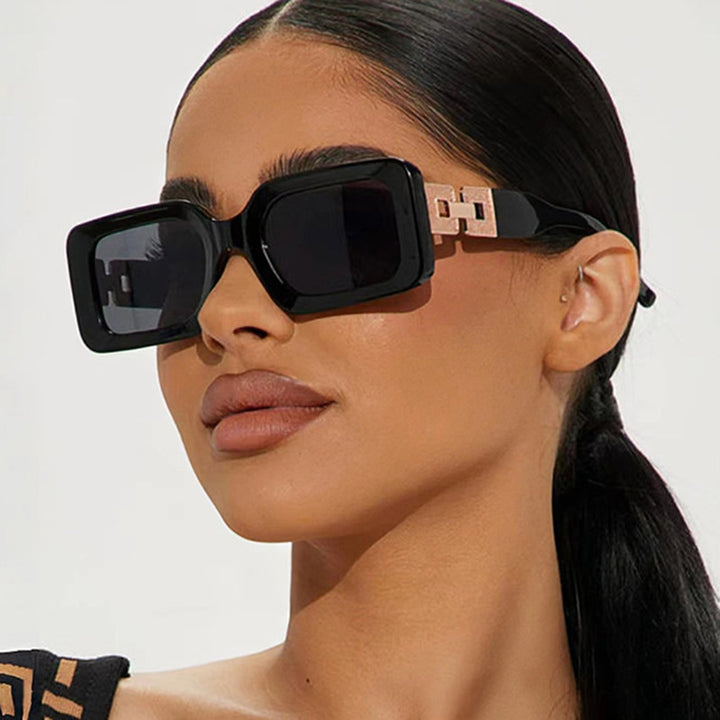 Women's fashionable sunglasses in elegant square design with luxurious gold details Skanto