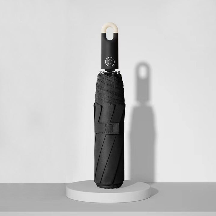 Dame elegant foldes regnparaply med ergonomisk håndtak og UV-beskyttelse Skanto