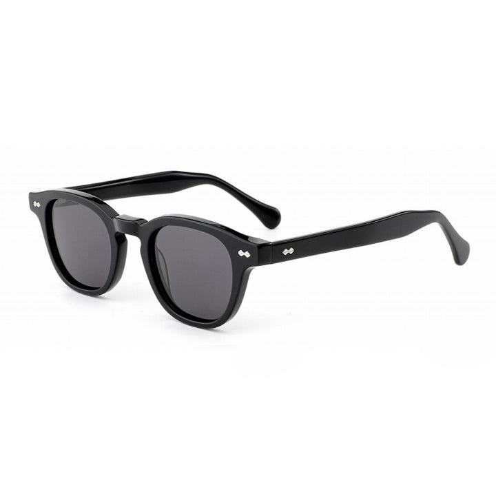 Dame solbrille i tidløs, moderne design med robust ramme Skanto