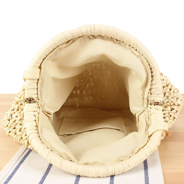 Shoulder bag made of handmade natural fibers with elegant chain embellishment Skanto