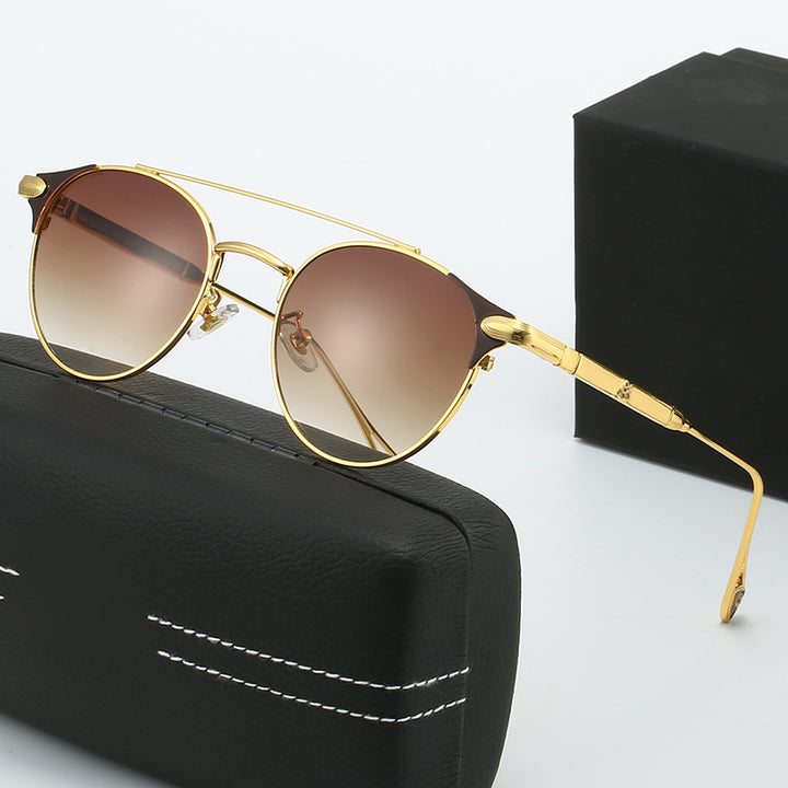 Dame rund Vintage-solbrille med høykvalitets metallramme og robust design Skanto