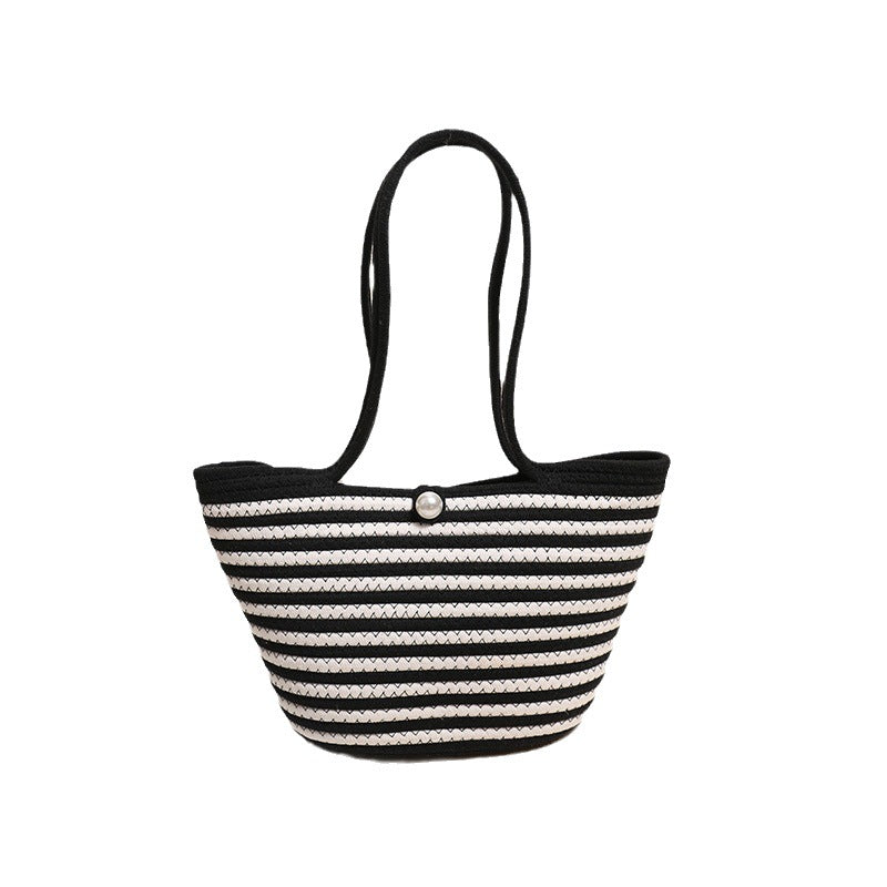 Trendy handbag with stylish stripes Skanto