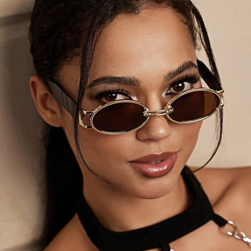 Women's oval sunglasses with golden accents and stylish frame Skanto