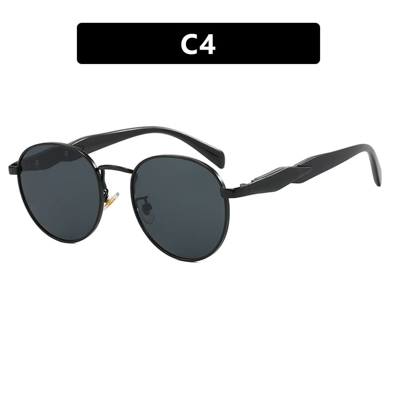 Women's round sunglasses with elegant, gold frame and UV protection Skanto