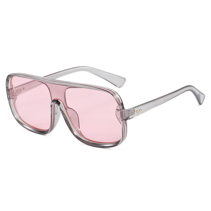 Dame fashionable oversized solbriller i futuristisk design Skanto