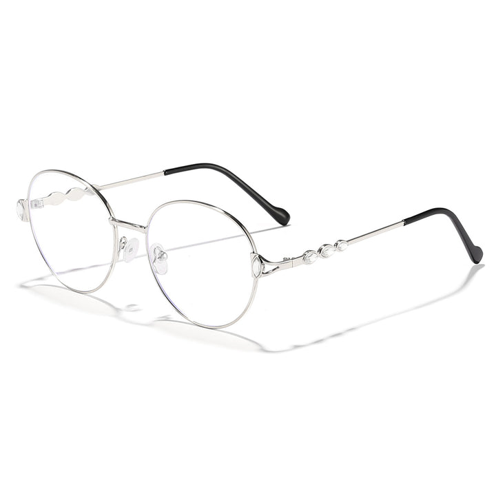Dame rund solbrille med elegant metallramme og speilvendte glass Skanto